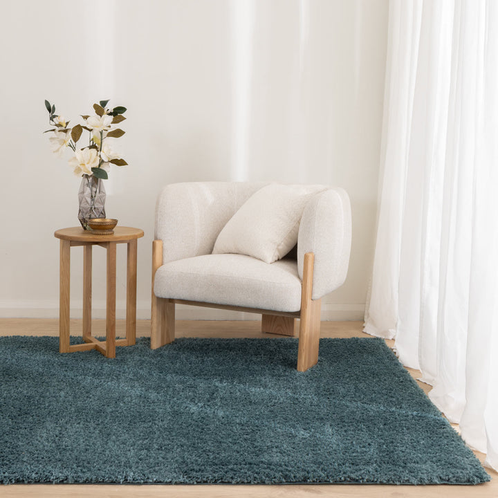 Lune Teal Shaggy Rug styled in a modern Australian living room