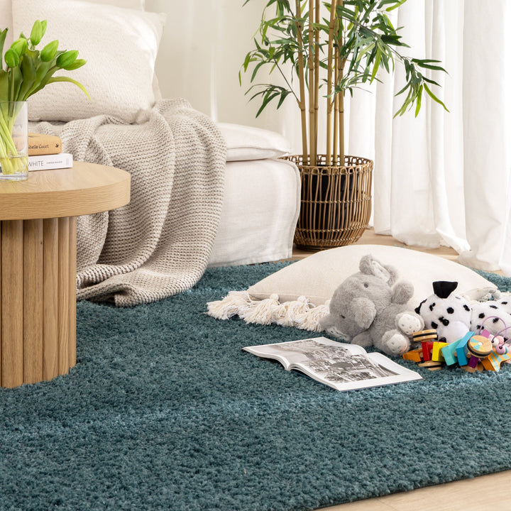 Lune Teal Shaggy Rug flat lay living room and teal colour