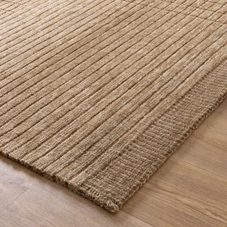 Corner view of beige checkered rug with detailed woven texture.