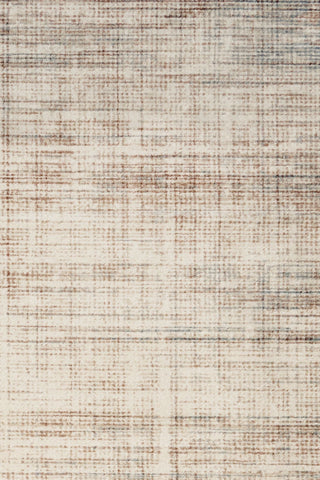 Close-up of a brown rug surface with a textured weave.