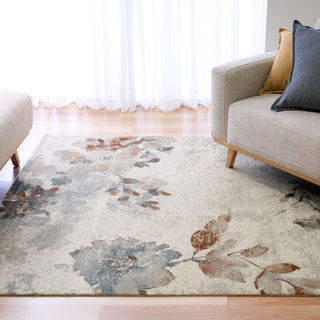 Floral patterned rug in a bright living room setup.