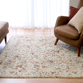 Side view showing thick pile of a beige and brown rug.