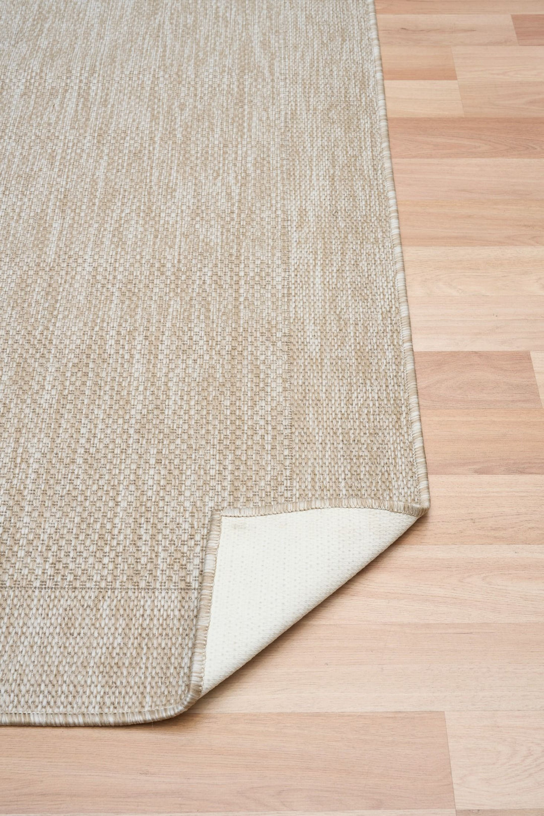 Angled close-up of dawn foam rug corner.