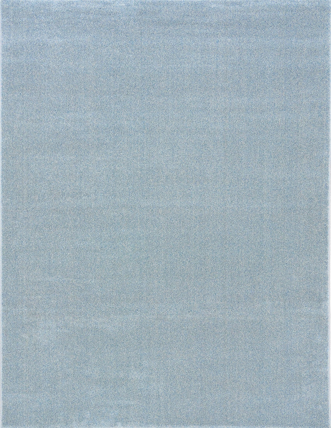 Detailed texture shot of the light blue rug surface.