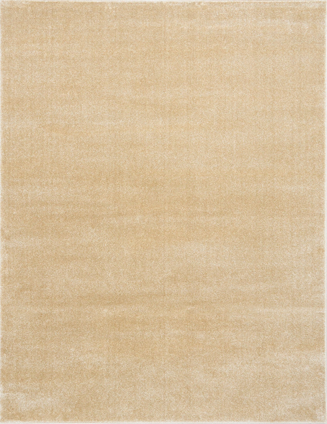 Beige rug full-frame image highlighting its even tone.