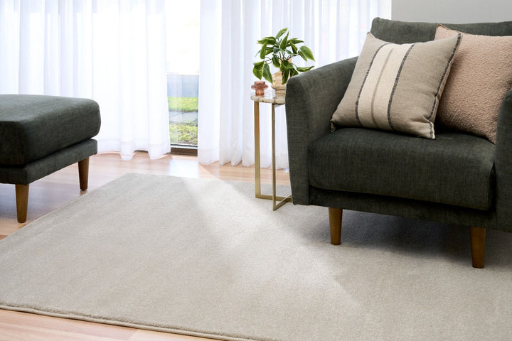 Eclipse Presidente rug styled in a modern living room with sofa.