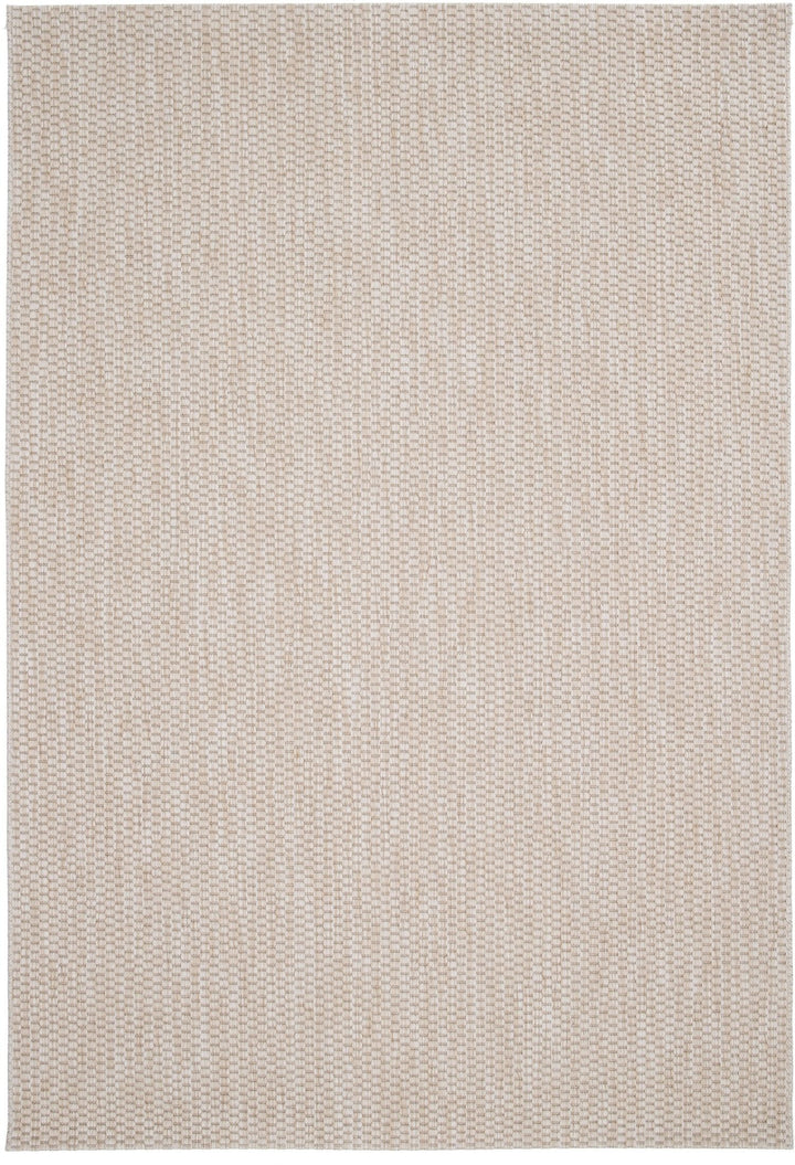 Top-down view of an ivory-beige flat-woven area rug with a tight basketweave texture and clean, borderless edges.