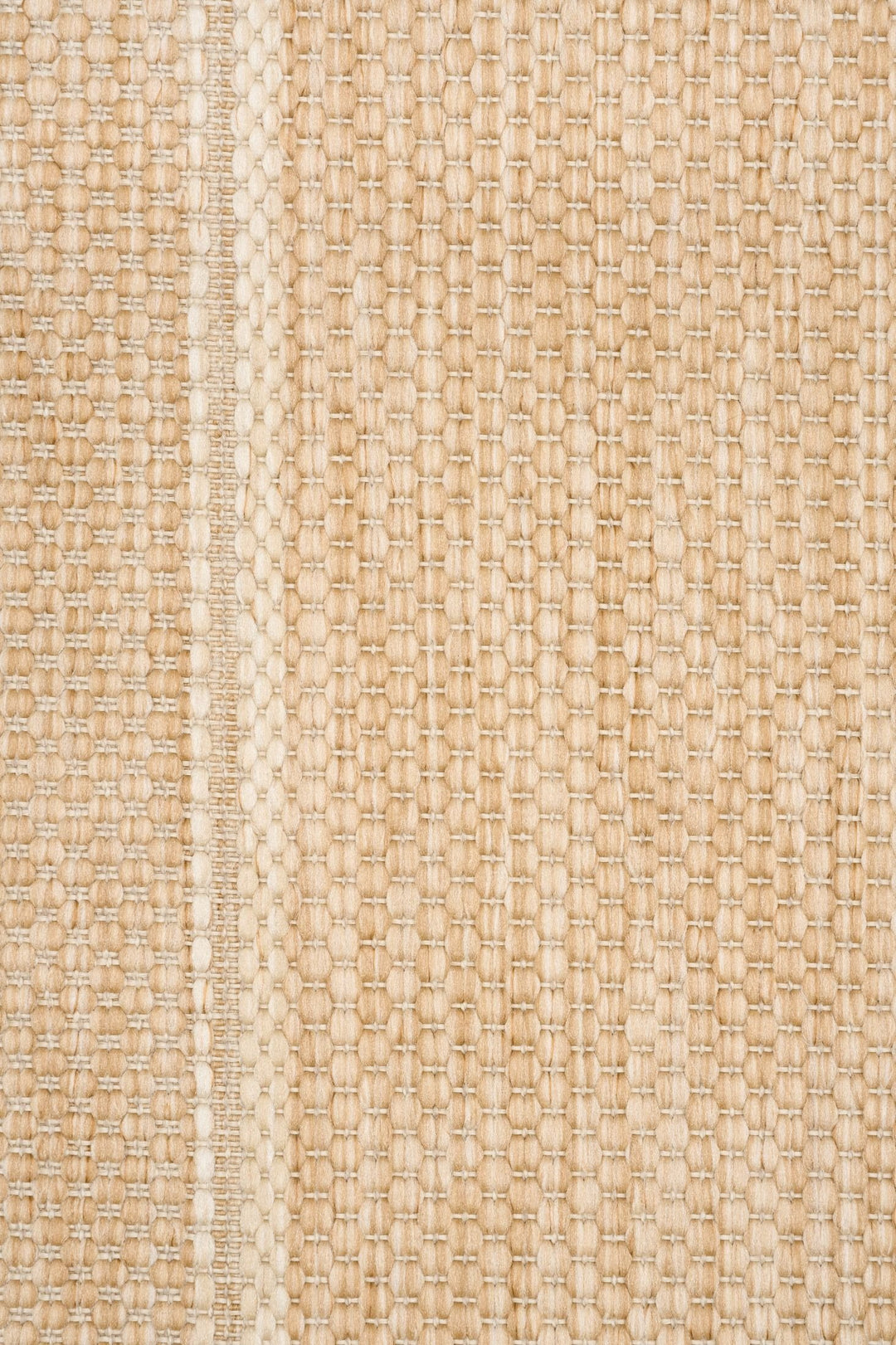 Close-up swatch of a beige Barton woven area rug in sand, showing textured weave and border seam detail.