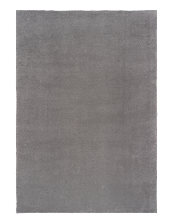 A plain rectangular grey rug photographed from above.