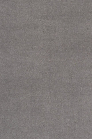 Close-up fabric swatch of a grey rug showing its soft texture.