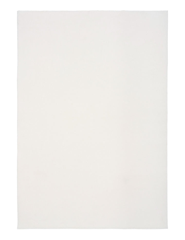 A plain rectangular white rug photographed from above.