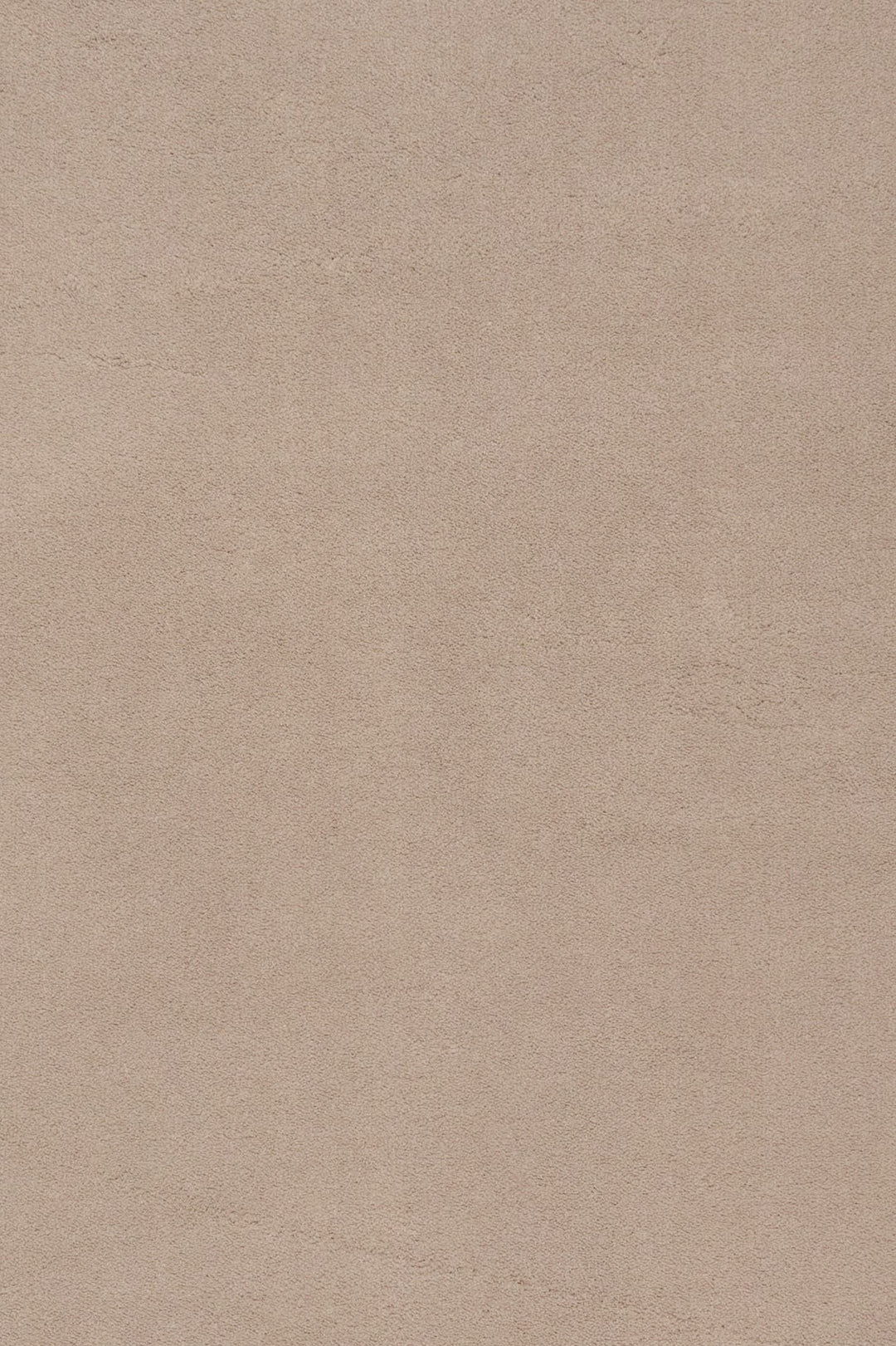 Close-up fabric swatch of a clay rug showing its textured surface.