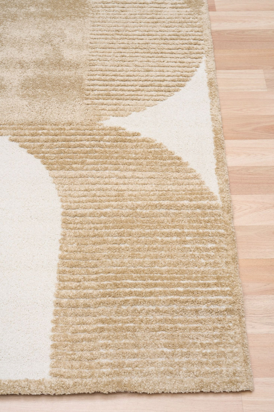 Rug corner with textured pattern.