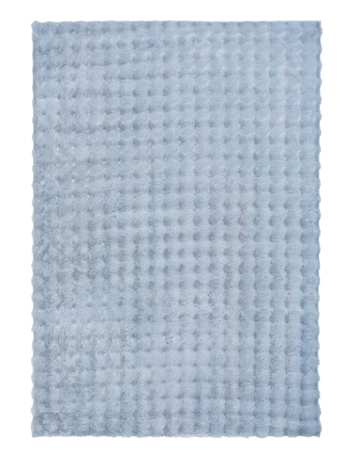 Full rectangular light blue textured fluffy rug on plain background.