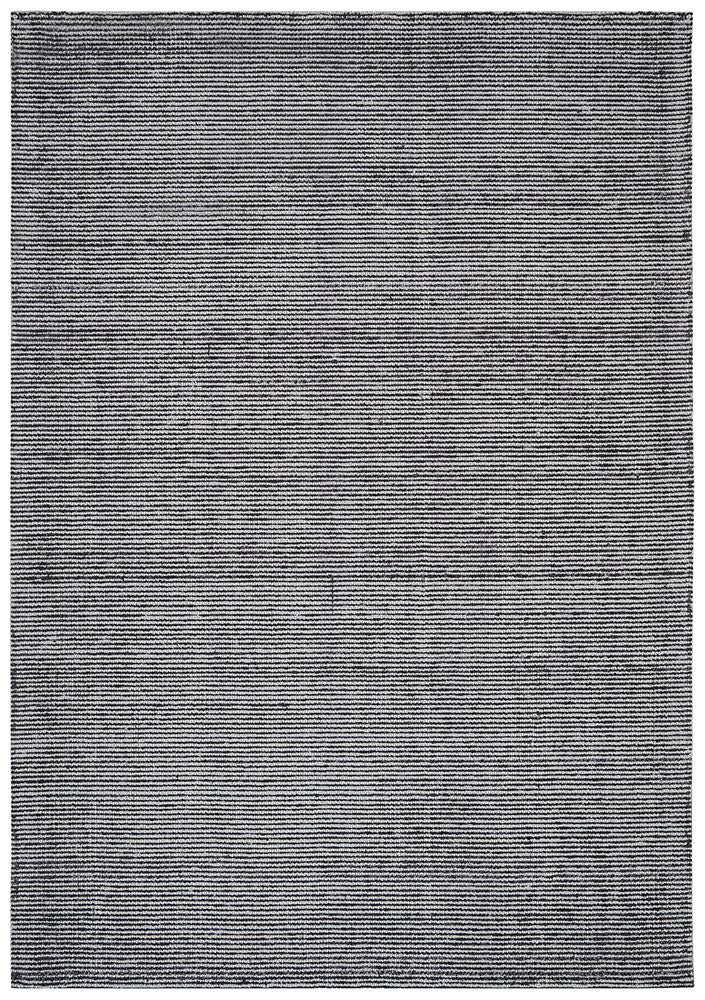Full view of Allure Black cotton rayon rug displaying striking black textured pile.