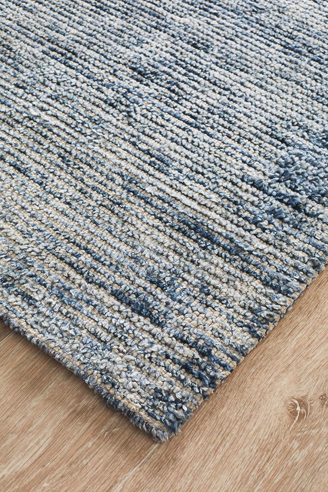 Allure Indigo rug corner detail highlighting premium cotton rayon textured pile.