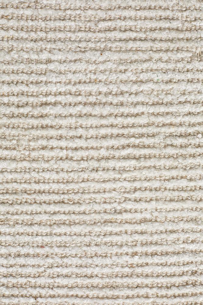 Detailed shot of Allure Ivory rug showing subtle cream undertones in ivory